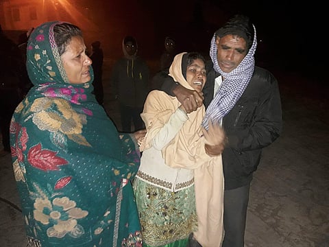 Family members of a victim of the boiler explosion at Sasa Musa Sugar Factory mourn in Gopalganj on Thursday morning. (Photo | PTI)