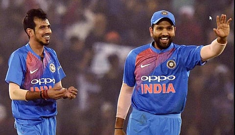 India captain Rohit Sharma (R) with his spinner Yuzvendra Chahal | PTI