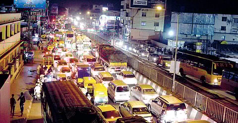 Saturday night saw heavy traffic on Mysuru Road as a large number of private vehicles were heading out of the city | Vinod Kumar T