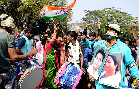 TMC supporters celebrate after party candidate Gita Rani Bhunia won Sabang Assembly by-election in West Midnapore district on Sunday. | PTI