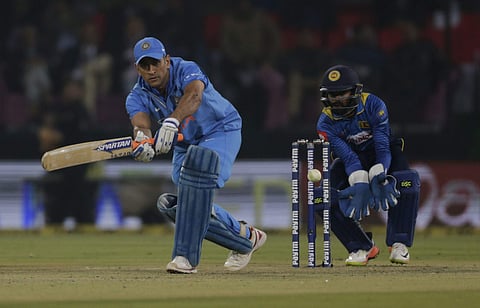 India's Mahendra Singh Dhoni plays a shot during their second T20 international against Sri Lanka in Indore, India, Friday, Dec. 22, 2017. | AP
