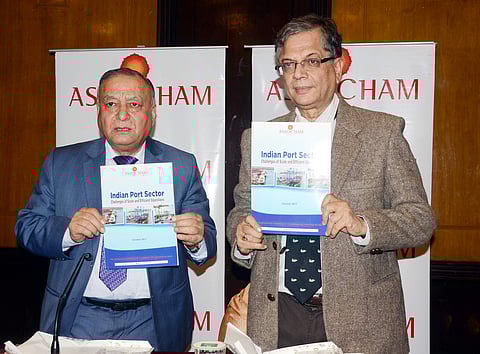 Assocham secretary general DS Rawat and chief advisor Dr Arvind Kumar releasing the study on Indian Port Sector at Bhubaneswar on Tuesday. (Express Photo Service | Biswanath Swain)