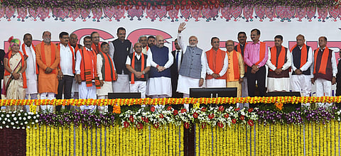 Prime Minister Narendra Modi, BJP President Amit Shah along with new CM Vijay Rupani and other state ministers during the swearing-in ceremony at Gandhinagar Ahmedabad in Gujarat on Tuesday. | PTI
