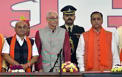 Gujarat Chief Minister Vijay Rupani and Deputy CM Nitin Patel along with Governor Om Prakash Kohli during the swearing-in ceremony. | PTI