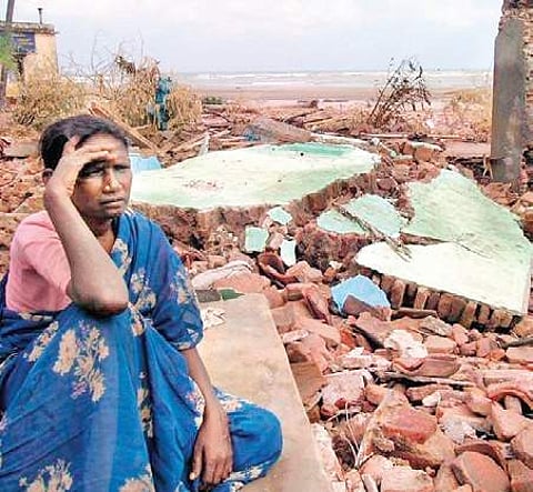 A file photo of a woman who lost all her belongings to the giant waves in December 26, 2004, tsunami in Nagapattinam district | Express