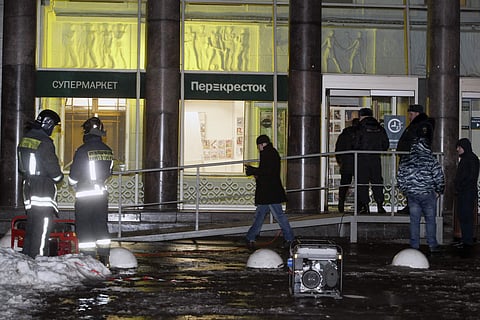 Police stand at the entrance of a supermarket, after an explosion in St.Petersburg, Russia, Thursday, Dec. 28, 2017. | AP