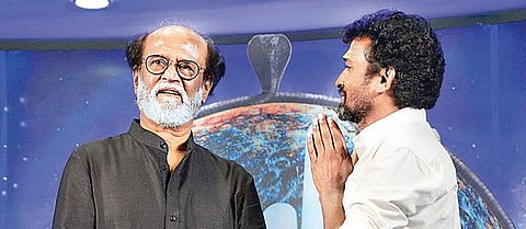 Rajinikanth with a fan at Ragavendra Mandapam on Wednesday | Express