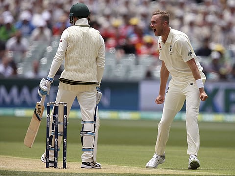 England's Stuart Broad, right, celebrates trapping Australia's Peter Handscomb LBW for 36 runs during the second day of their Ashes test match in Adelaide, Sunday, Dec. 3, 2017. | AP