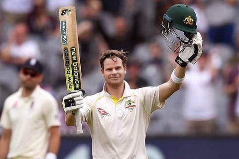 Australia's captain Steve Smith celebrates scoring his century against England on the final day of the fourth Ashes cricket Test match at the MCG in Melbourne. | AFP