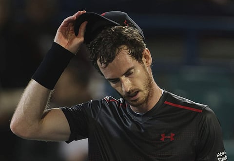Andy Murray reacts after he lost the match to Roberto Bautista Agut | AP