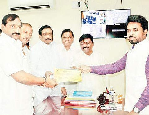 TDP nominee KE Prabhakar receiving the Certificate of Election from Joint Collector V Prasanna Venkatesh in Kurnool on Friday | Express