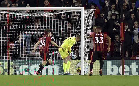 AFC Bournemouth's Ryan Fraser (L) celebrates scoring his side's second goal of the game against Everton | AP