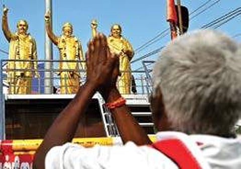 An AIADMK cadre seen worshiping the statue unveiled during the event in Coimbatore on Sunday | A RAJA CHIDAMBARAM