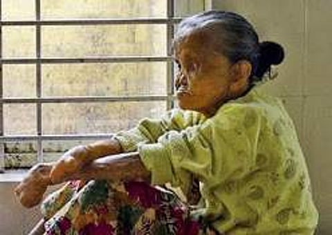 Sajidha, who lost her fingers and eyesight, was informed that her pension of Rs 1,000 per month would stop if she failed to link it with her Aadhaar, for which fingerprint and iris scan are a must. (Express Photo)