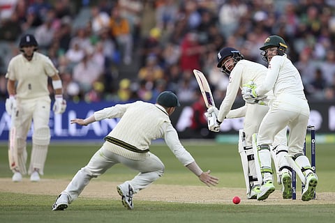 England's James Vince see his shot go past David Warner during the fourth day of their Ashes | AP