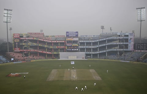 Floodlights are on as the fog envelops Ferozshah Kotla ground during the fourth day of third Test match between India and Sri Lanka in New Delhi, India, Tuesday, Dec. 5, 2017. | AP