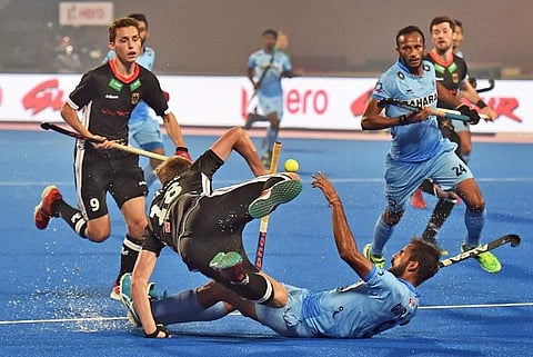 Bhubaneswar Gurjant Singh 9 of India falling down after charge with German defender Weinke Ferdinand 18 during Men's Hockey World league at Kalinga Stadium in Bhubaneswar on Monday evening. (Photo | PTI)