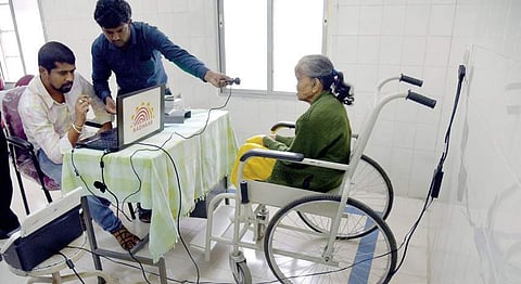 Aadhaar officials register 65-year-old Sajida Begum for the card at the Leprosy Hospital on Magadi Road on Tuesday | Vinod Kumar T