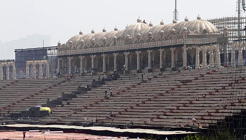 NGT hearing a petition claiming the AoL event held between March 11 and 13 , 2016 had severely damaged the Yamuna floodplains has held the foundation responsible for damage. (EPS file photo of workers building a stage at the venue of the World Culture Fes
