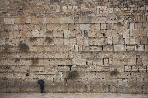An Ultra-Orthodox Jewish man prays in front of the Western Wall, the holiest site where Jews can pray, in Jerusalem's Old City. (AP File Photo)