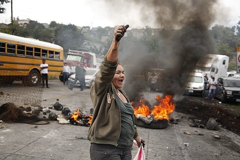 An anti-government protestor near the roadblocks on the outskirts of Tegucigalpa, Honduras | AP