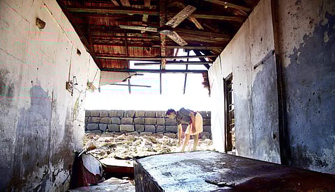Prasad, a native of Nayarambalam, at a house damaged in the cyclone Ockhi. Even after 9 days, people are yet to return to their homes | Albin Mathew