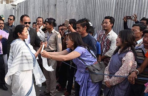 West Bengal Chief Minister being greeted by people of Kalimpong during the formation of new Kalimpong district in West Bengal on Tuesday. (EPS)