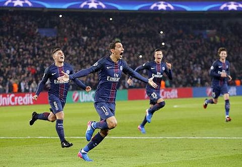 PSG's Angel Di Maria, second left, celebrates after scoring the first goal of the game during the Champion's League round of 16 match between PSG and Barcelona. (AP)