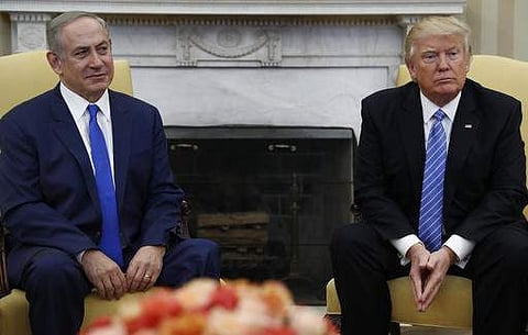 US President Donald Trump and Israeli Prime Minister Benjamin Netanyahu meet in the Oval Office of the White House in Washington on February 15. (Photo | AP)