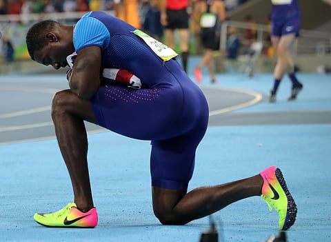 United States' Justin Gatlin reacts at the end of the 100-meter men's race where he won silver during the athletics competitions of the 2016 Summer Olympics at the Olympic stadium in Rio de Janeiro, Brazil, Sunday, Aug. 14, 2016. | AP