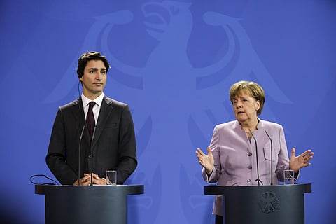 German Chancellor Angela Merkel, right, and the Prime Minister of Canada Justin Trudeau brief the media after talks at the chancellery in Berlin, Friday, Feb. 17, 2017.(Photo | AP)