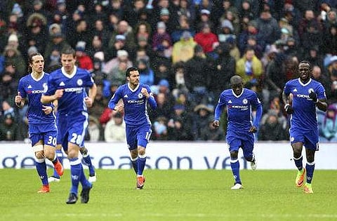 Chelsea's Pedro, third left, celebrates scoring his side's first goal during the English Premier League soccer match between Burnley and Chelsea at Turf Moor stadium. | AP