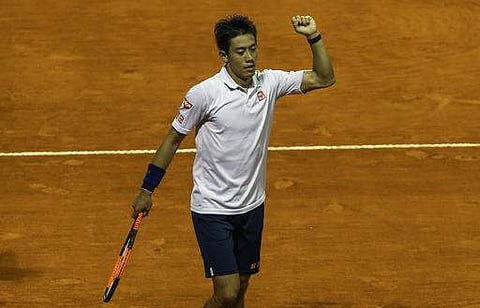 Kei Nishikori of Japan, celebrates after winning his match against Joao Sousa of Portugal, during an ATP Argentina Open tennis match, in Buenos Aires. | AP