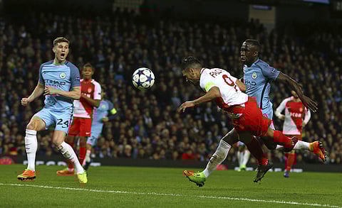 Monaco's Radamel Falcao scores his side's first goal during the Champions League round of 16 first leg soccer match between Manchester City and Monaco at the Etihad Stadium in Manchester, England, Tuesday Feb. 21, 2017. | AP