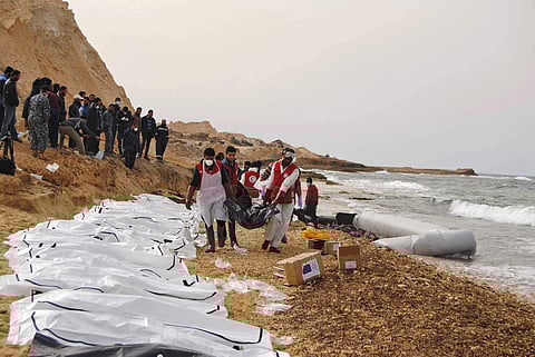 Libyan Red Crescent workers recovering bodies of people that washed ashore. (File Photo | AP)