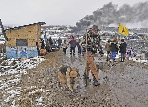Opponents of the Dakota Access pipeline leave their main protest camp. (Photo | AP)