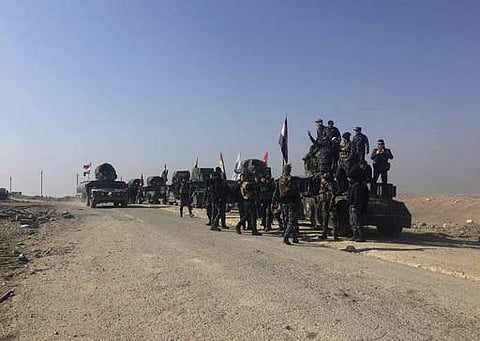 Iraqi Federal police forces advance towards the western side of Mosul on February 23. (File photo | AP)
