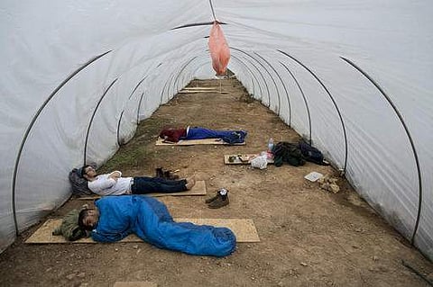 Jewish settlers rest in an unauthorized Israeli outpost in the West Bank, east of the Palestinian town of Ramallah. (File photo | AP)
