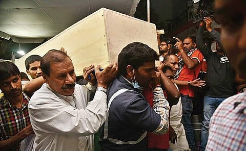 Body of Srinivas which arrived at the Rajiv Gandhi International Airport, being taken to his residence at Bachupally in Hyderabad on Monday night | R Satish babu