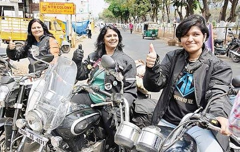 Three women riders on their way to Kolkata from Pondichury as part of ‘Be Bold for Change’ initiative in connection with the International Women’s Day, in Vijayawada on Monday. They will reach Kolkata on March 7 and participate in the Women’s Day Celebra