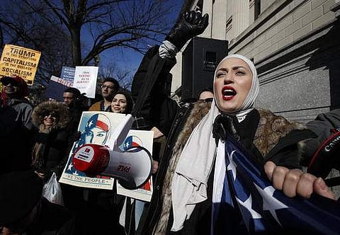 A demonstrator chants during a rally protesting the immigration policies of President Donald Trump, near the White House in Washington.(Photo | AP)