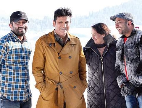 Shivarajkuamr with wife Geetha, producer Tarun Shivaappa and director Narasimha