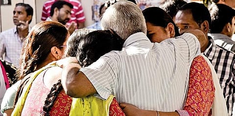 Kuchibhotla’s family members huddle into each other’s arms at his funeral at Vaikunta Mahaprasthanam crematorium in Hyderabad on Tuesday | vinay madapu