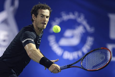 Andy Murray of Great Britain returns the ball to Malek Jaziri of Tunisia during the Dubai Tennis Championships in Dubai, United Arab Emirates, Tuesday, Feb. 28, 2017. | AP