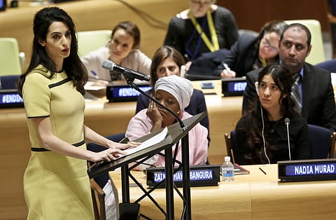 Amal Clooney, left, address a UNHR meeting called 'The Fight against Impunity for Atrocities: Bringing Da'esh to Justice,' (File Photo | AP)