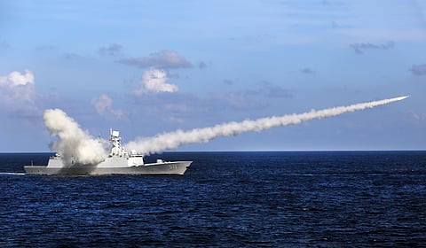 In this July 8 photo released by the Xinhua News Agency, Chinese missile frigate Yuncheng launches an anti-ship missile during a military exercise in the South China Sea. | AP File Photo
