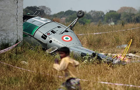 (L) The Chetak helicopter that crash landed near Bamrauli Air Base in Allahabad, Uttar Pradesh, on Wednesday; and a broken portion of the Sukhoi-30 MKI fighter that crashed near Shivkar Kudla, in Barmer district of Rajasthan | AFP, Pti