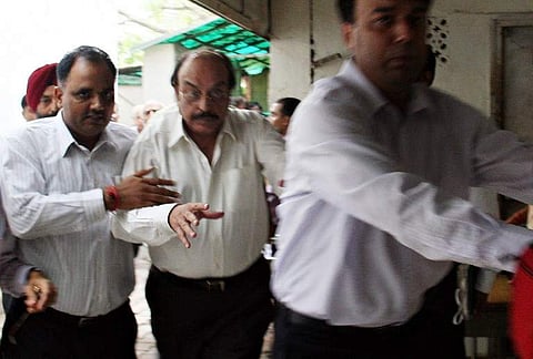 Indian real estate businessman businessman Gopal Ansal (C) (File | AFP)