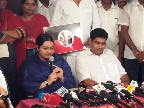 Madhavan, seen along with her wife Deepa while addressing a press confrerence during the launch of MGR Amma Deepa Peravai in February. Madhavan today announced him quitting the outfit. (File photo | EPS)