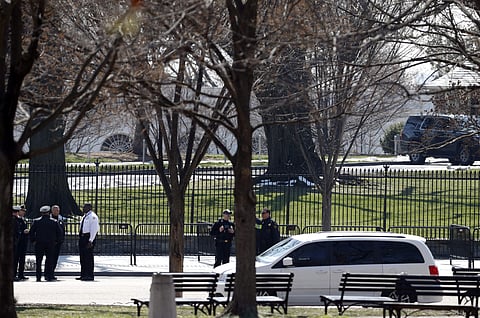 US Secret Service officers stand in the cordoned off area on Pennsylvania Avenue after a security incident near the fence of the White House in Washington, Saturday, March 18, 2017. | AP
